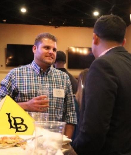 Alumni Mixer share Beach Pride