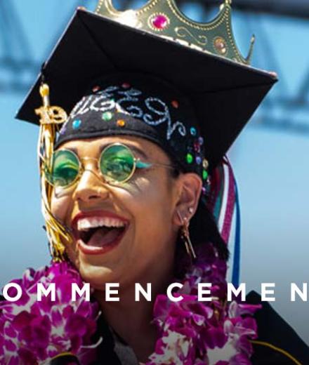 Graduate smiling in mortarboard