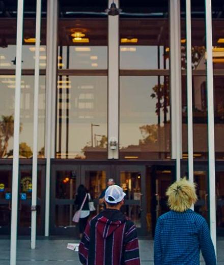 Students walk into the University Library