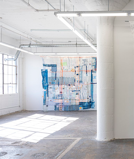 Fabric hanging in a gallery space