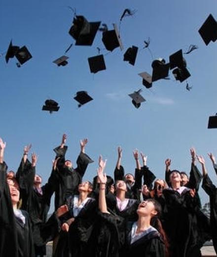 Image: graduation_hats_flying.jpeg