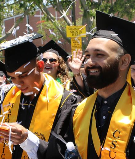 CSULB students celebrating commencement