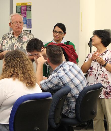 students and faculty at a gathering