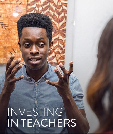student teacher gestures with hands