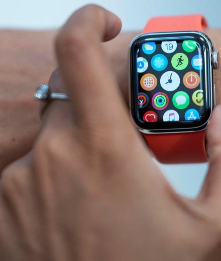 person checking smartwatch