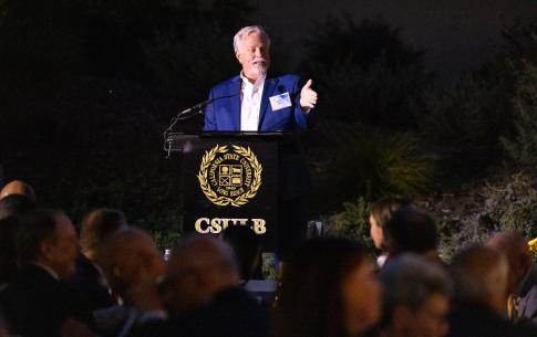 A man at a podium speaking