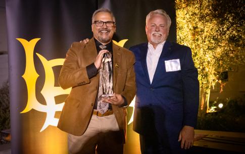 A man accepting an award