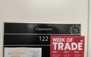 classroom 122 sign