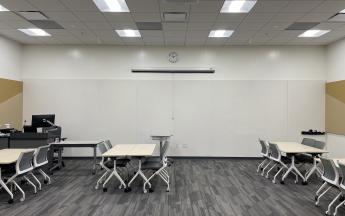 large whiteboard in the back of the classroom