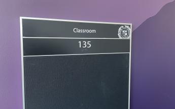 classroom 135 sign