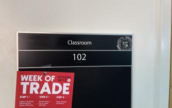 classroom 102 sign