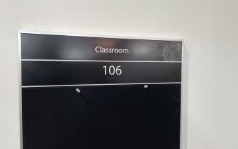 classroom 106 sign