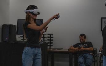 student wearing virtual goggles