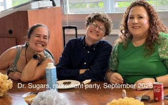 three people smiling