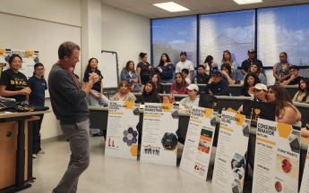 Marketing Professor rocking the audience at day at the beach