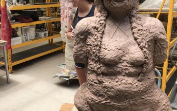 Artist in residence Raven Halfmoon with large sculptures in progress, 2019.