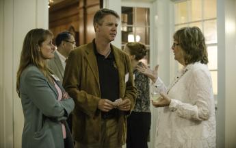 Biological Science’s Barbara Taylor, Michael B. Harris and President Jane Close Conoley  chat during the Public Knowledge Media Training culmination celebration at the Miller House on Nov. 29.