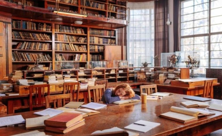 Distressed student in a library.
