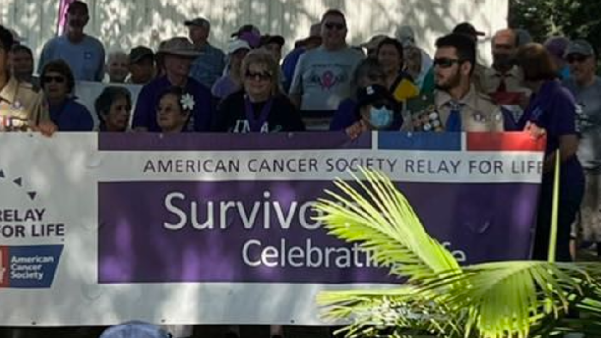 Banner for Relay for Life held  IN front of participants 2022