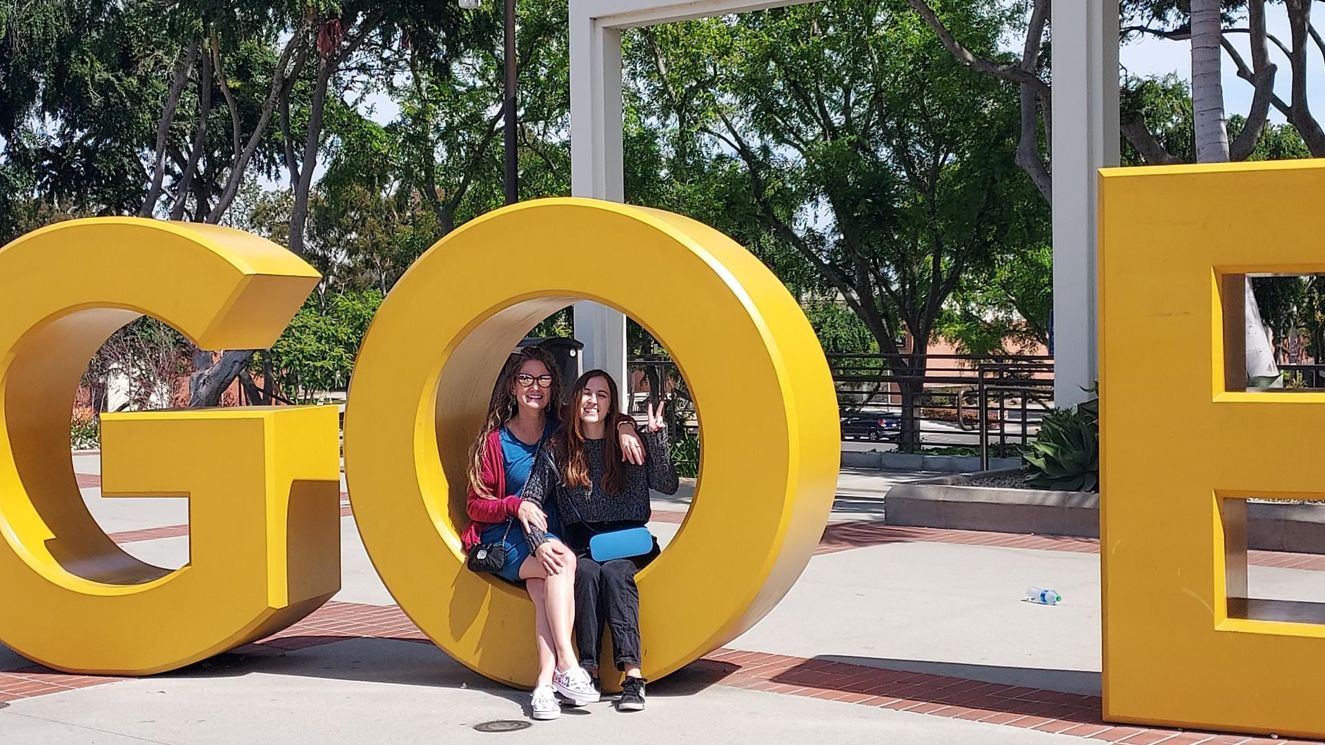 Brooke giving her mom a tour of campus