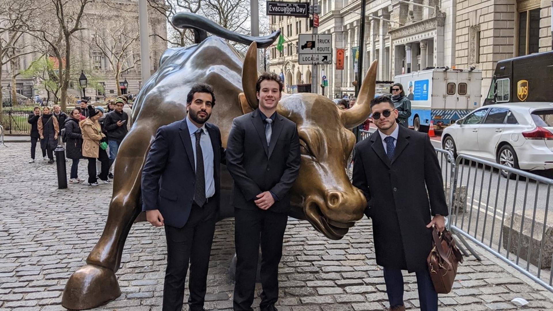 “Economics Analyst, Shayan with Portfolio Coordinator, Josiah and Value Analyst, Gavin” 