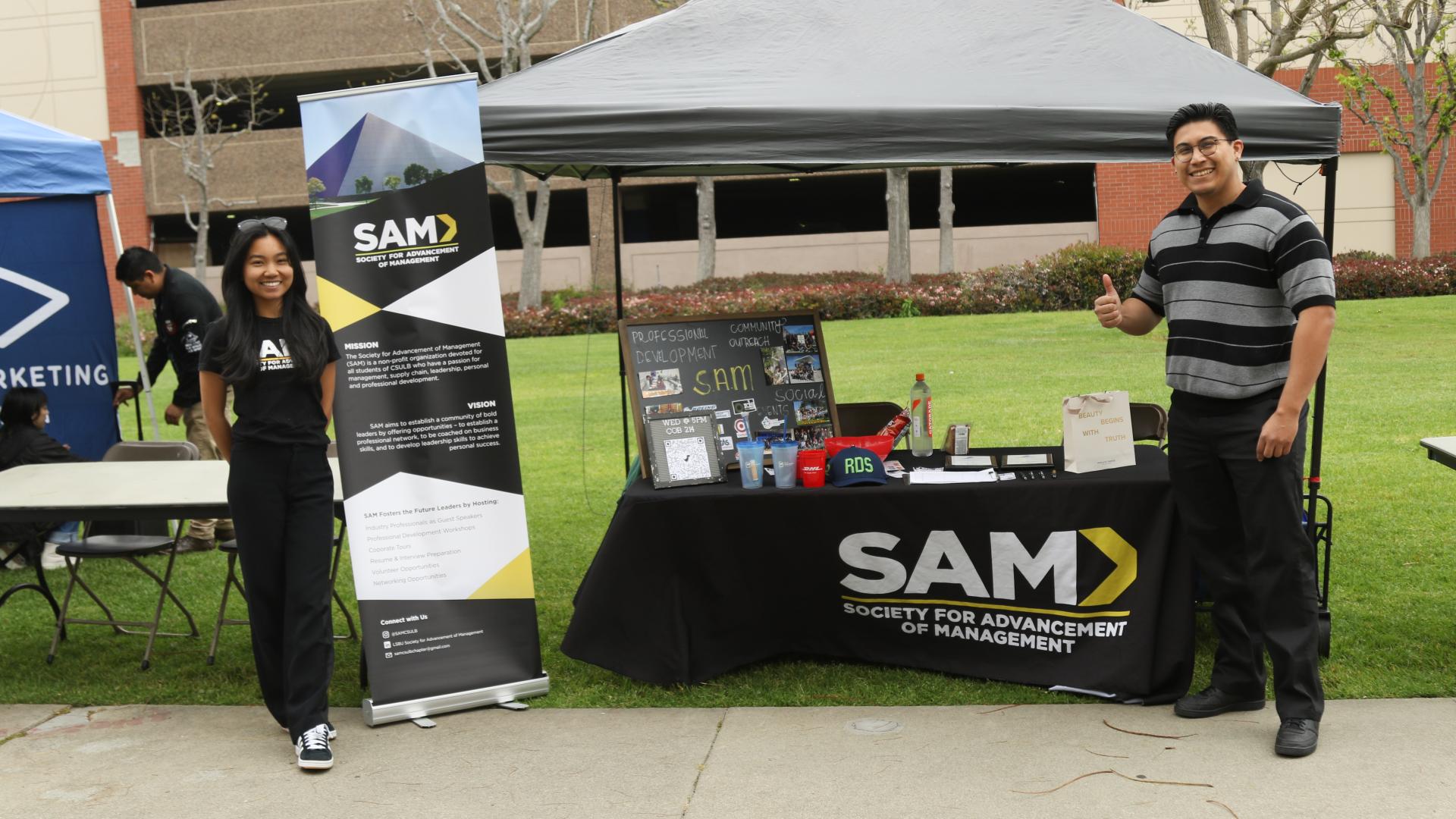 Society for Advancement of Management students displaying their activities of professional development