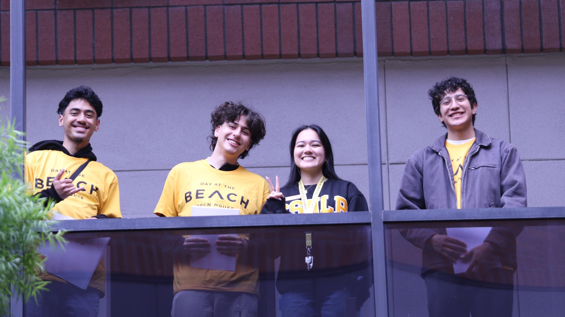 Emma Nguyen and Beach XP students inviting prospective students to learn about the College of Business BeachXP program for First Time First Year students