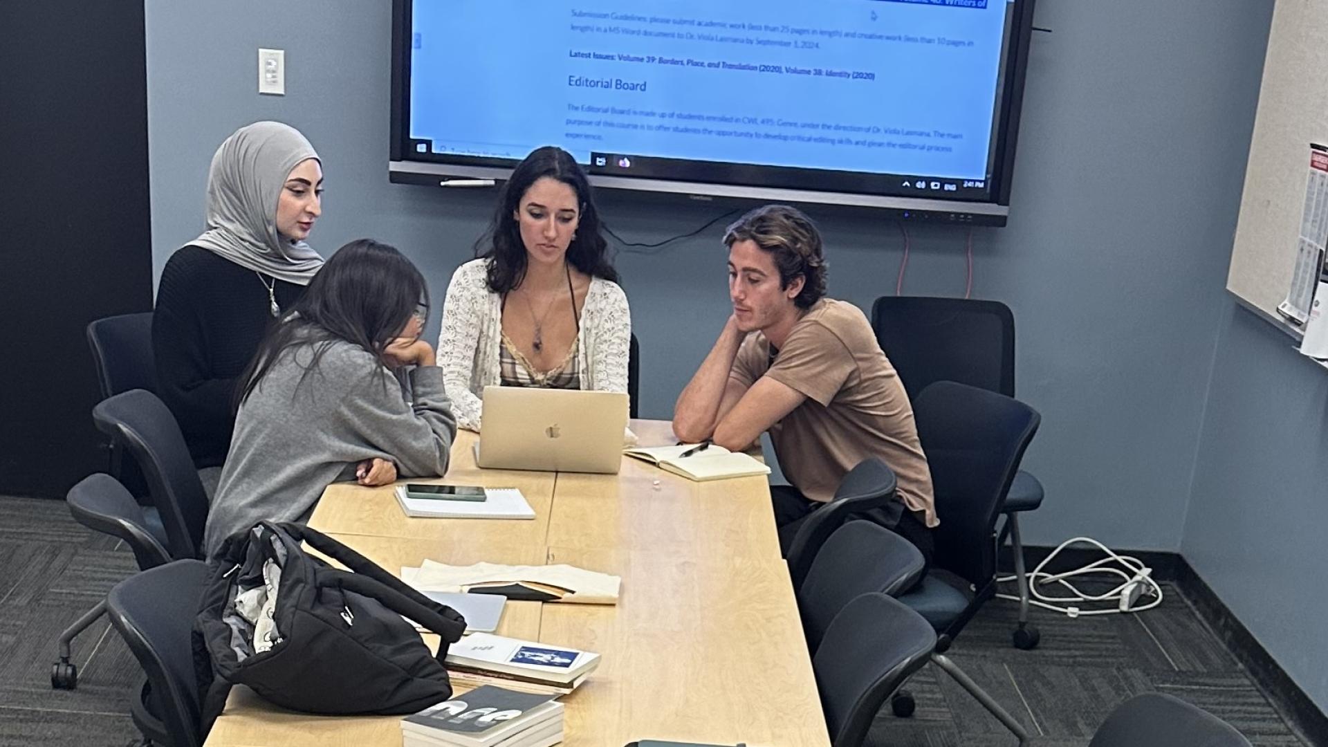 students sitting at table