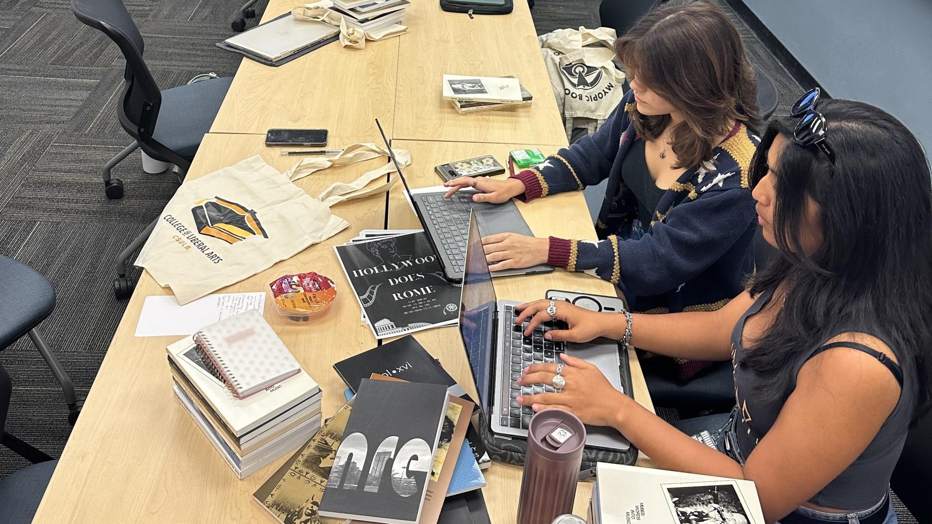 students typing on computers