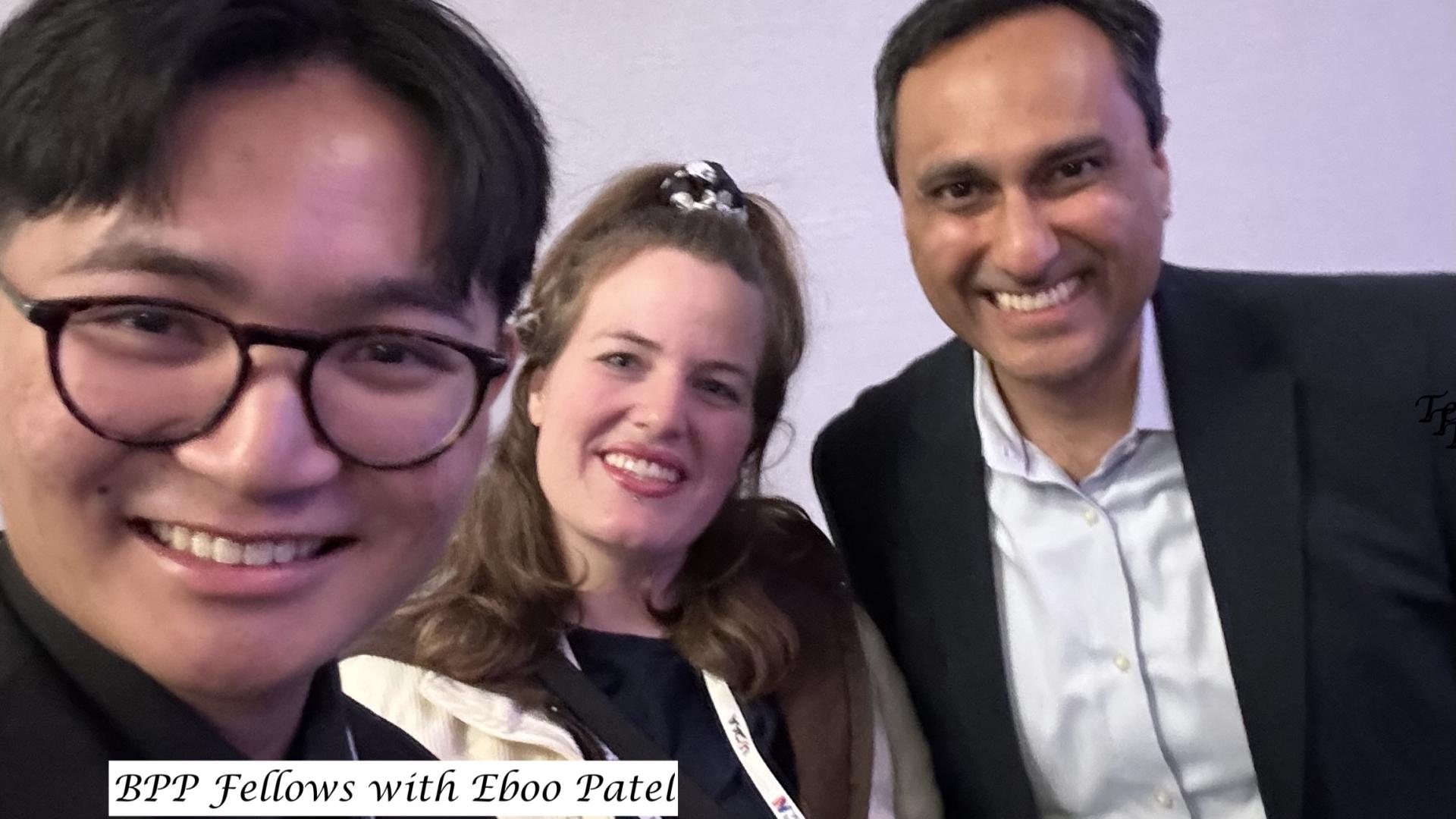 three people smiling
