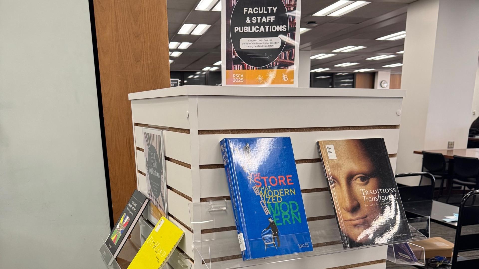 Faculty and staff publications display at the library.