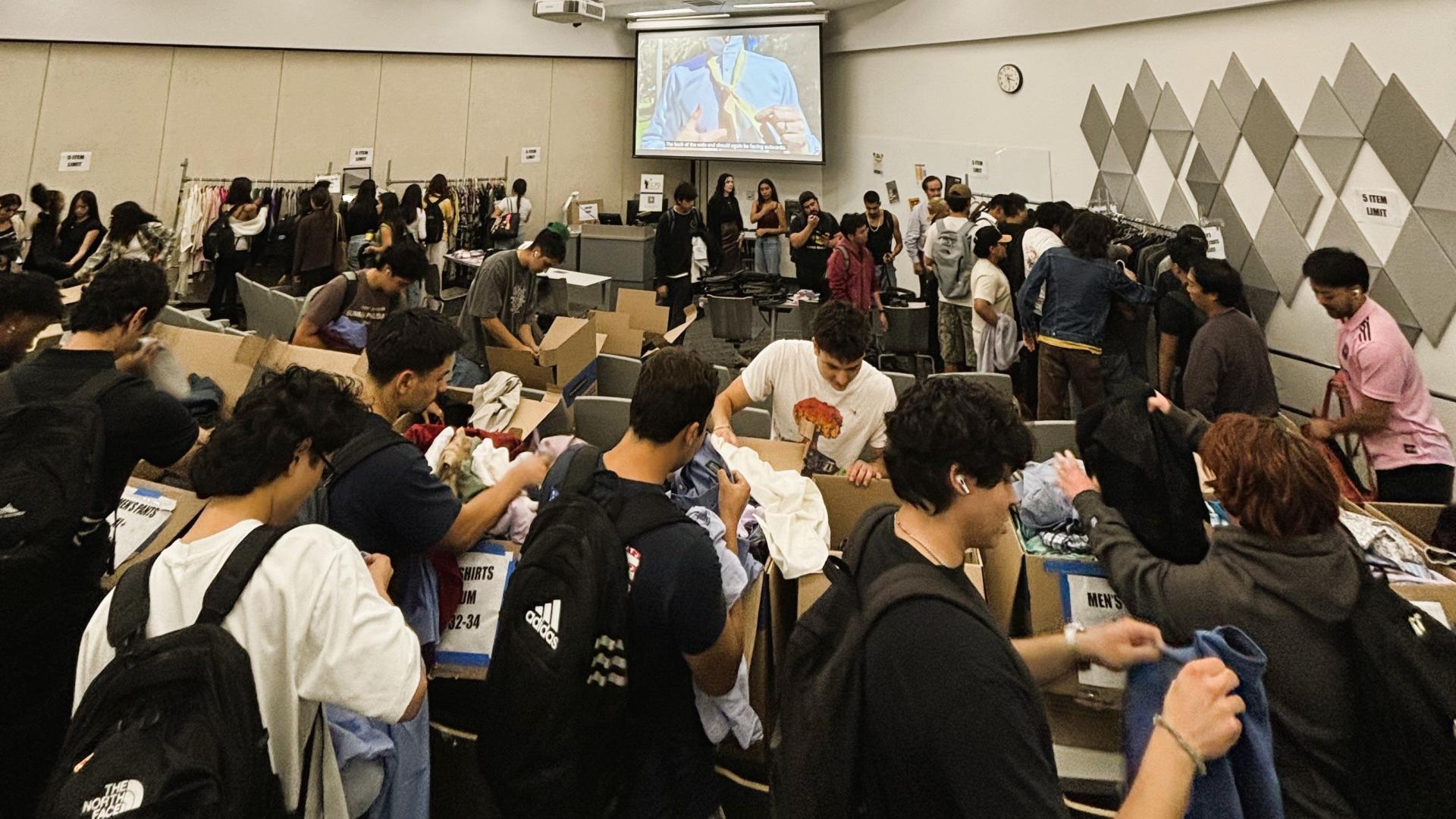 COB Closet event people trying on clothing