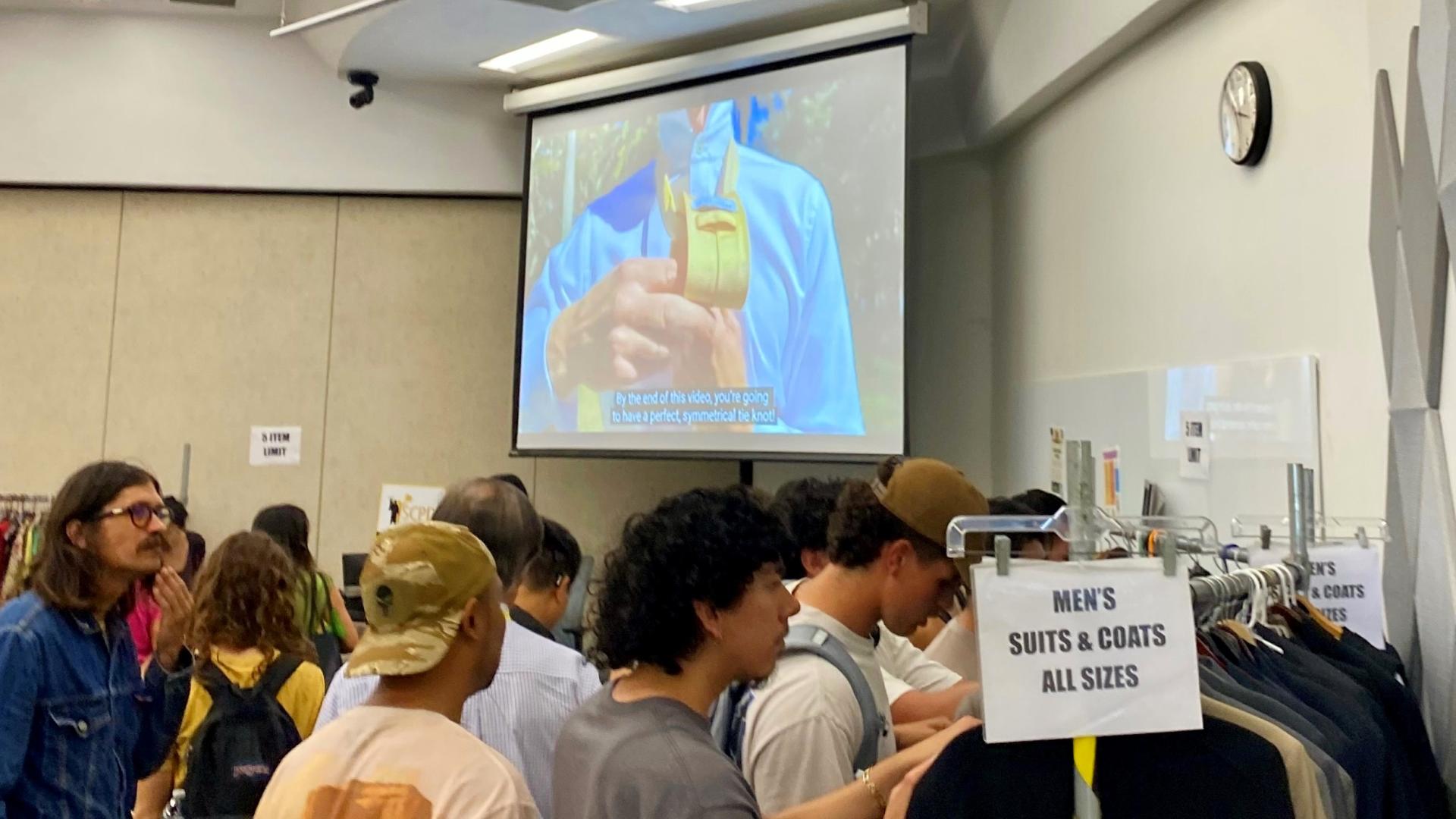 COB Closet event people trying on clothing