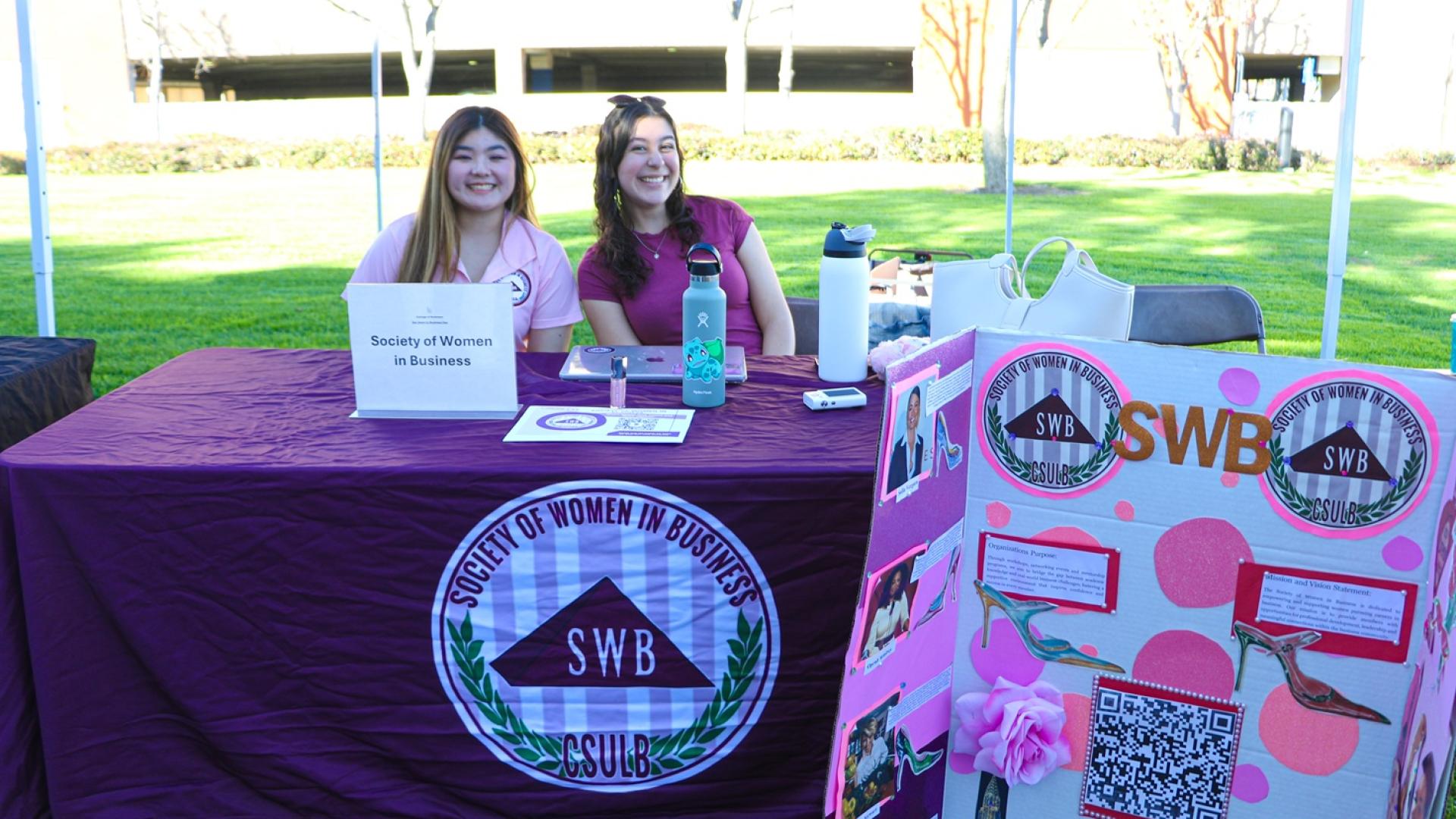 COB CSS get down to business 2026 Spring Event table with two female students