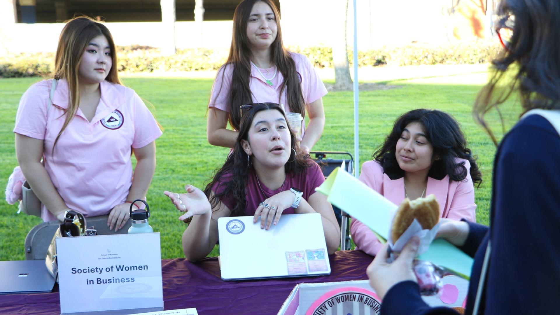 COB CSS get down to business 2026 Spring Event table with Woman Association