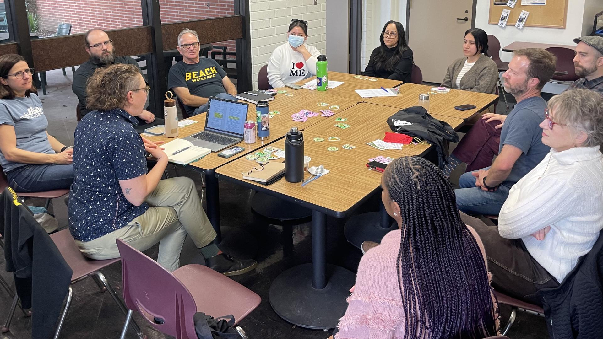A group of people sitting in a circle