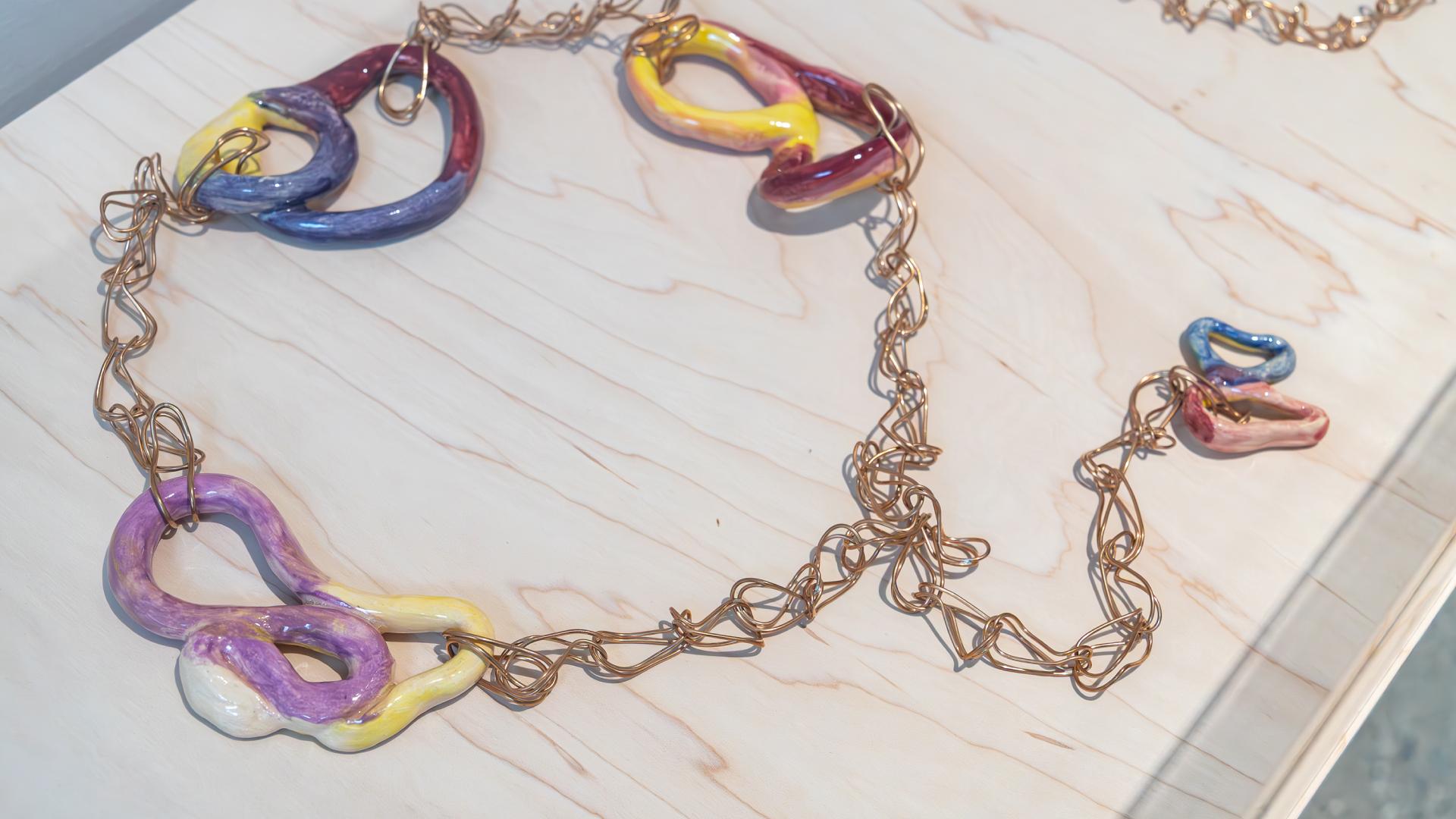 A jewelry art pieces by artist Jillian Thompson