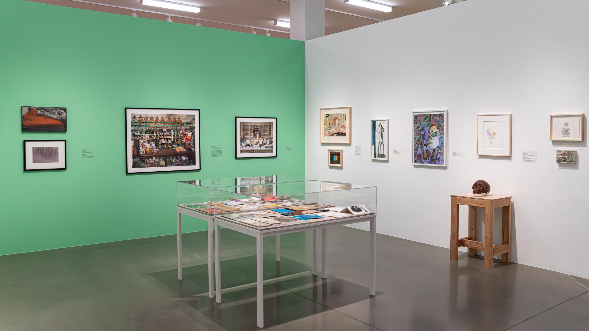 Multiple art pieces shown in the university art museum