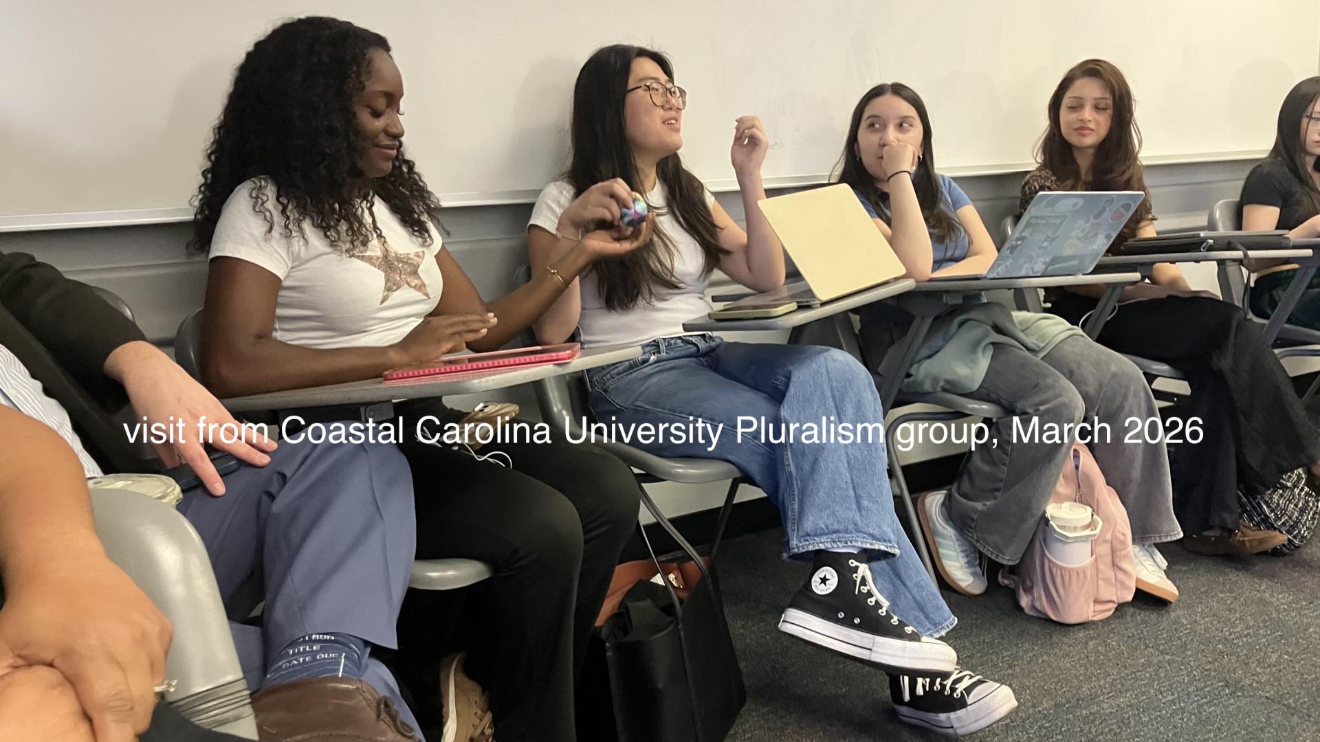 students discussing in class