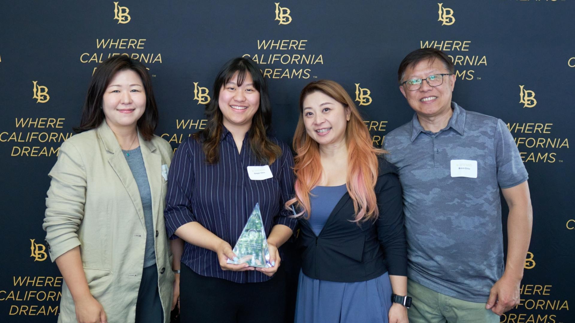 Ginger Chiu with her University Achievement Award.