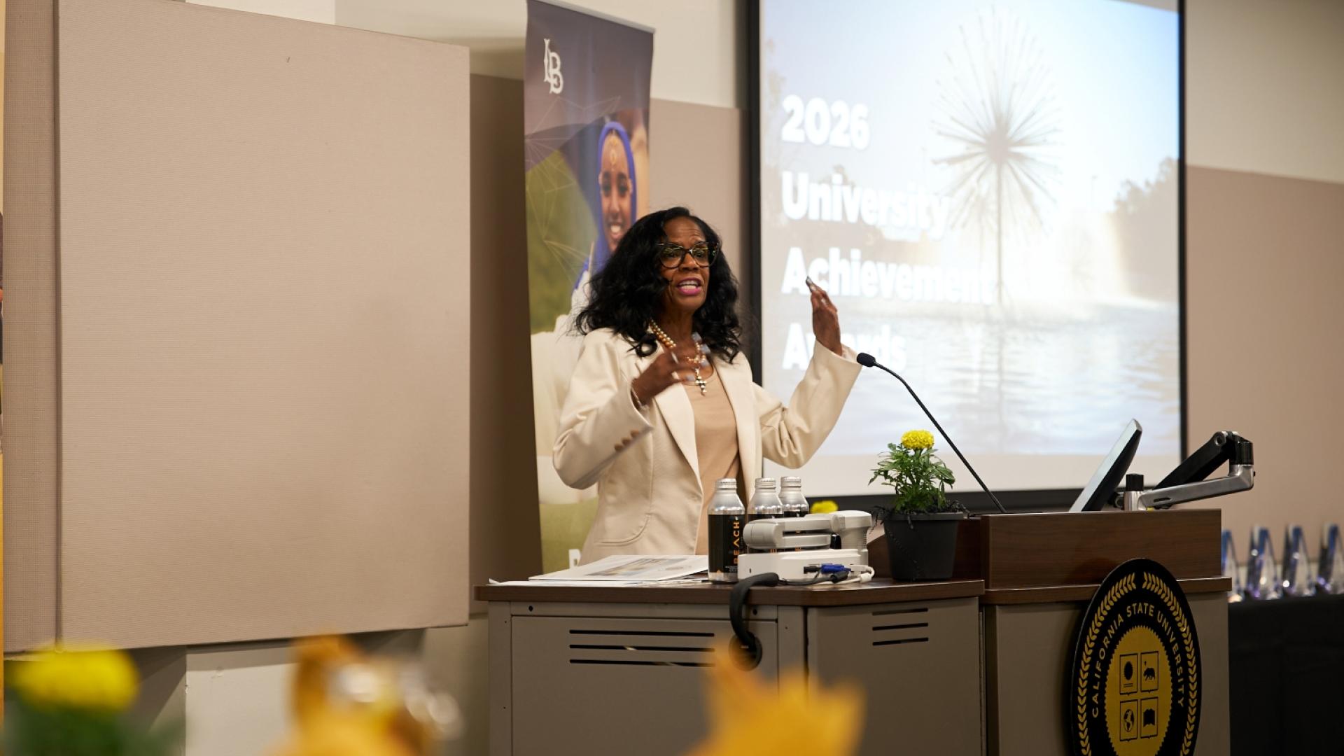 Provost Scissum Gunn presenting at the University Achievement Awards luncheon.