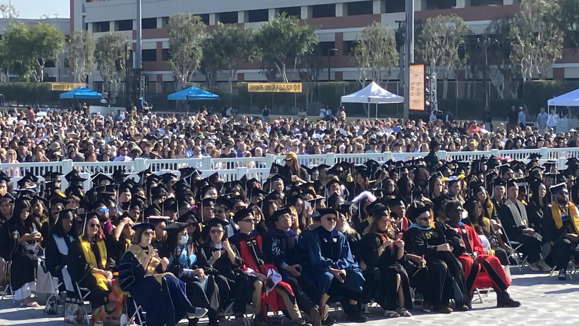 faculty and students at graduation