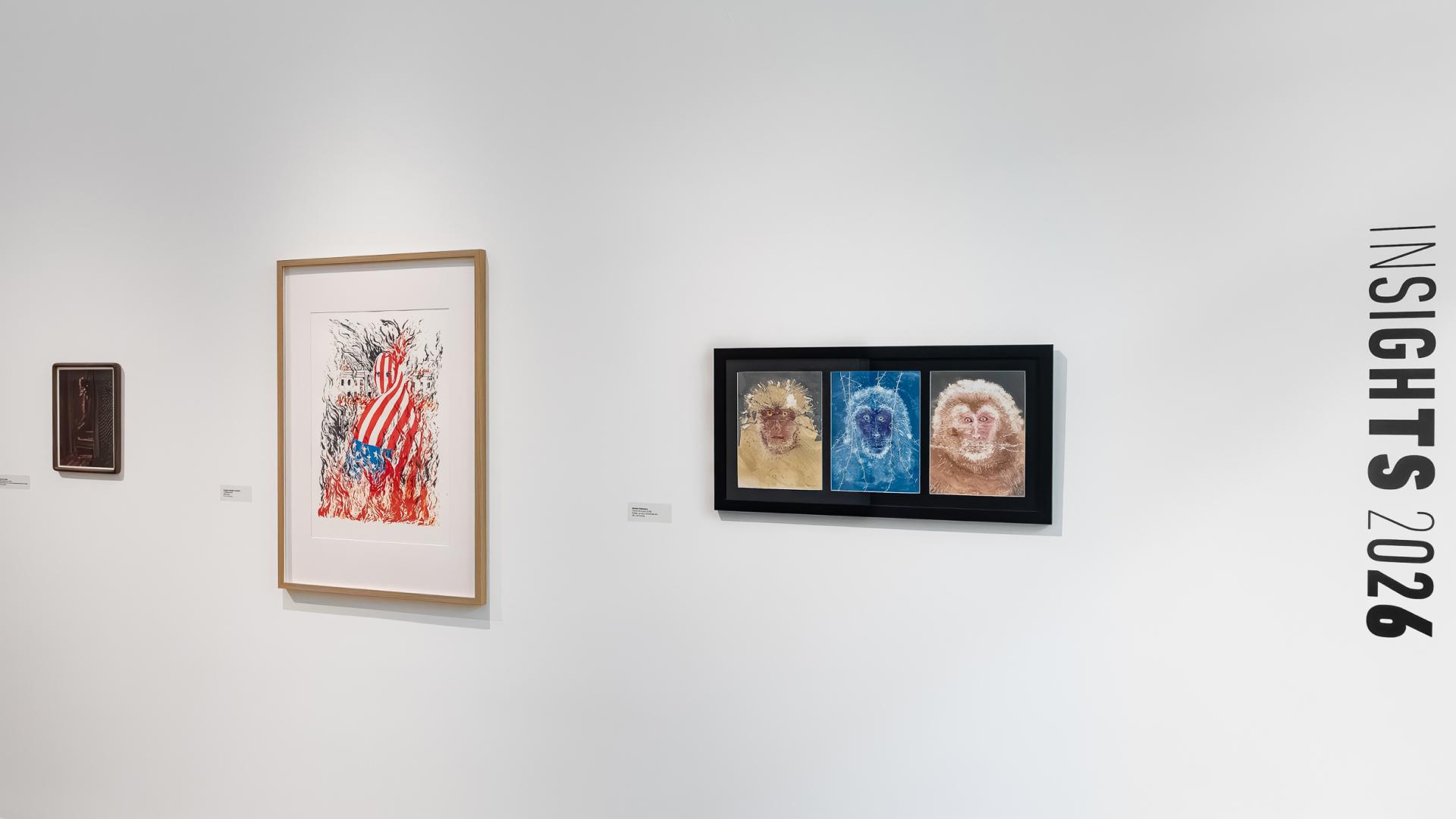 Three pieces of artwork on display in the university art museum