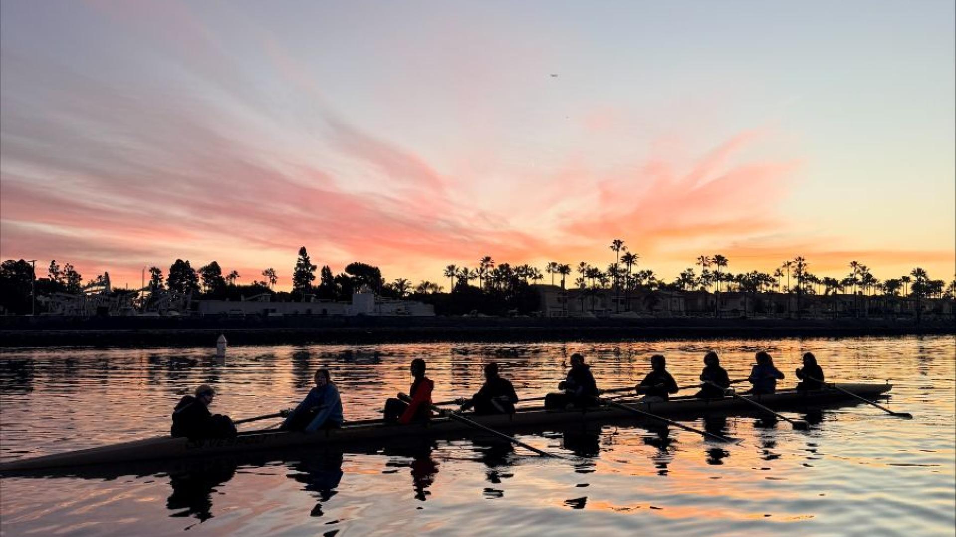 Breena Oyola rowing water