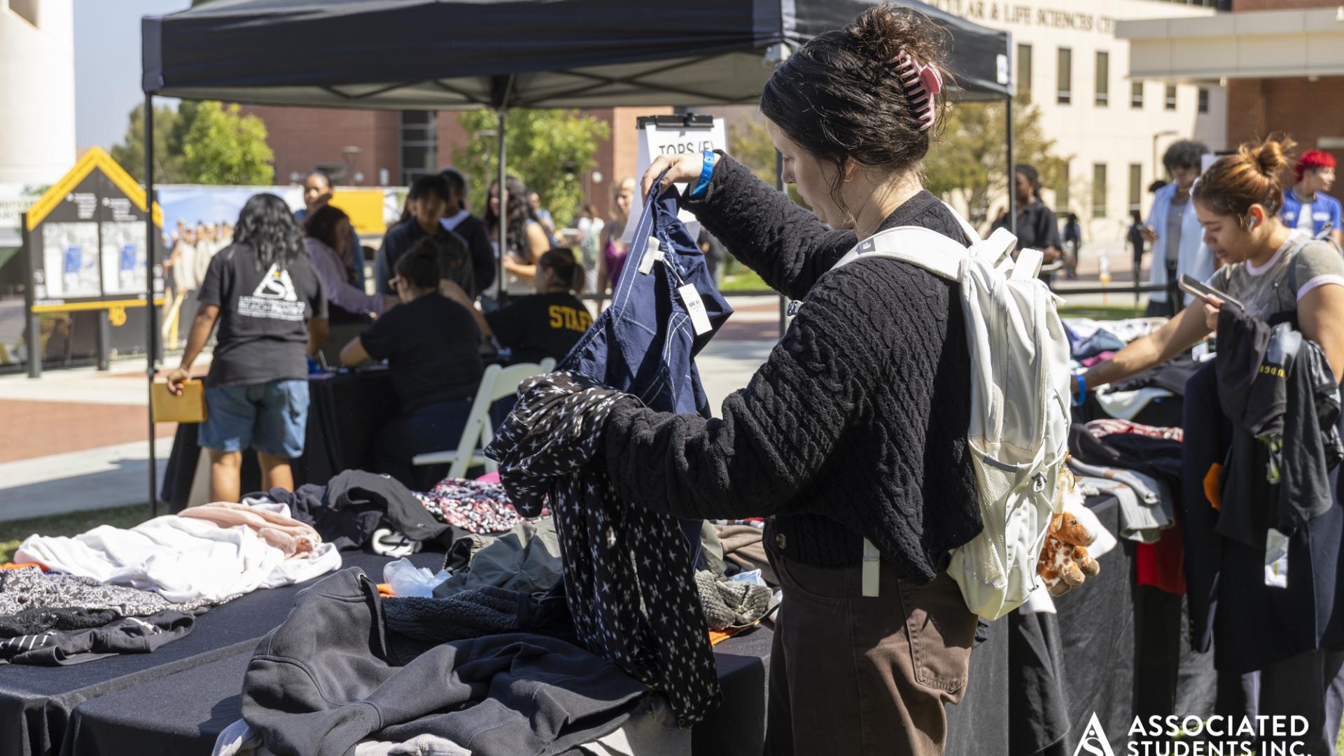 One student looking at a blouse