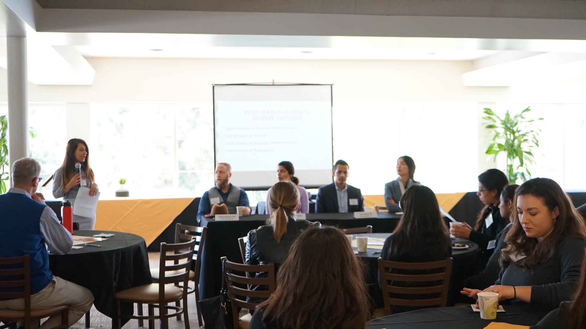 Speakers at Business Honors: Life After Graduation Panel 2019 COB 2019 HONORS Event Panel speakers sitting at a table