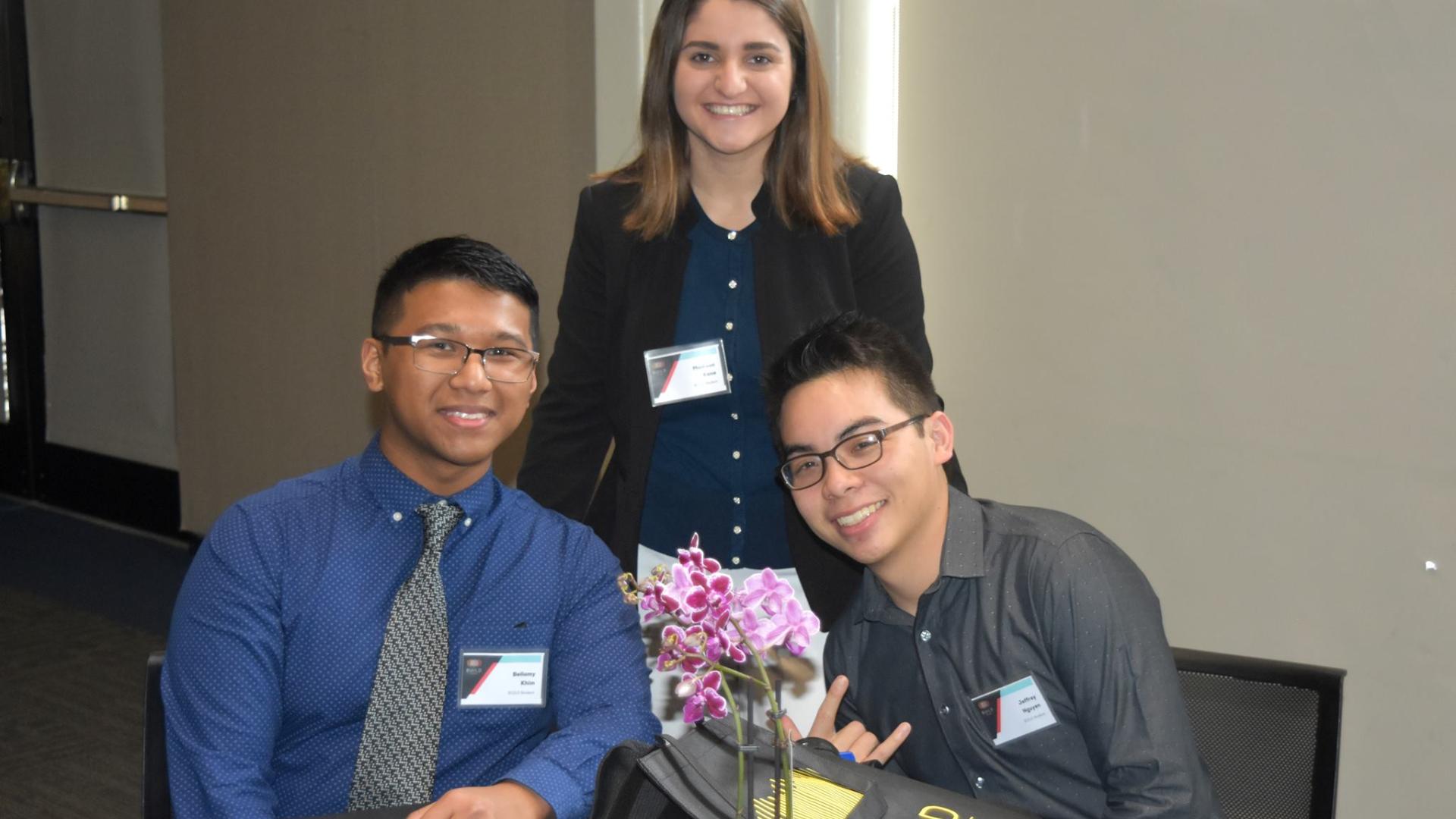 Bellamey Khim (left), Madison Kane (center) and Jeffrey Nguyen (left) at the Annual Symposium