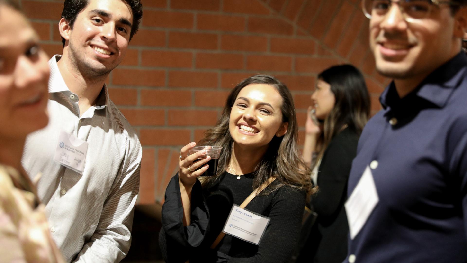 Current Grad Students enjoying a drink