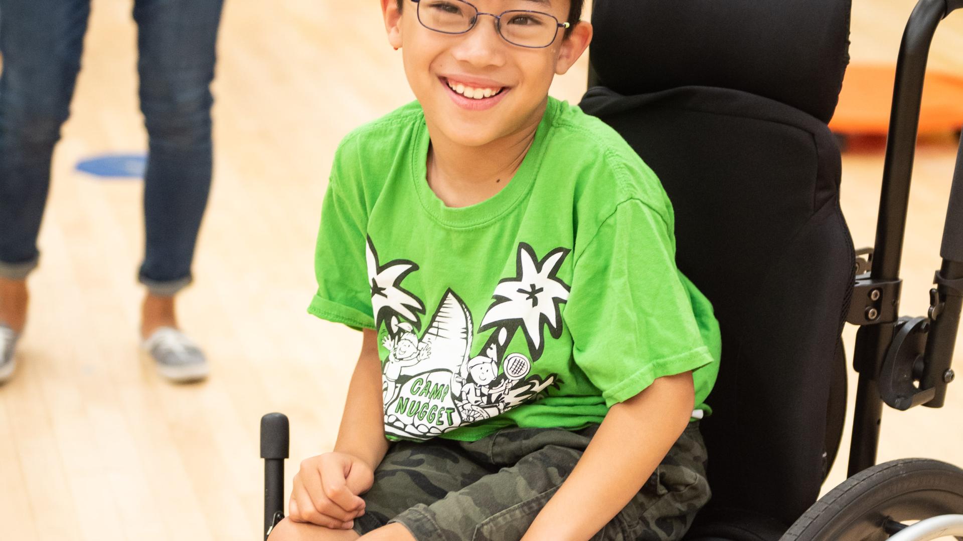 Child in wheelchair at Camp Nugget Child in wheelchair at Camp Nugget