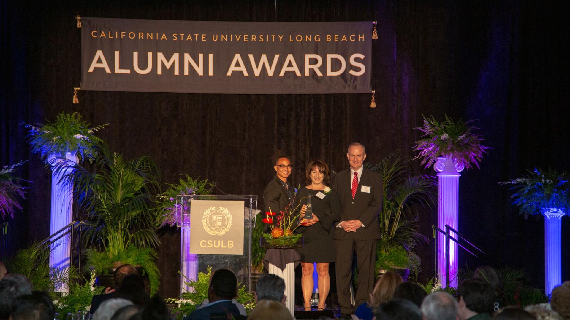 Distinguished Alumni Banquet  2019 COB dean on stage